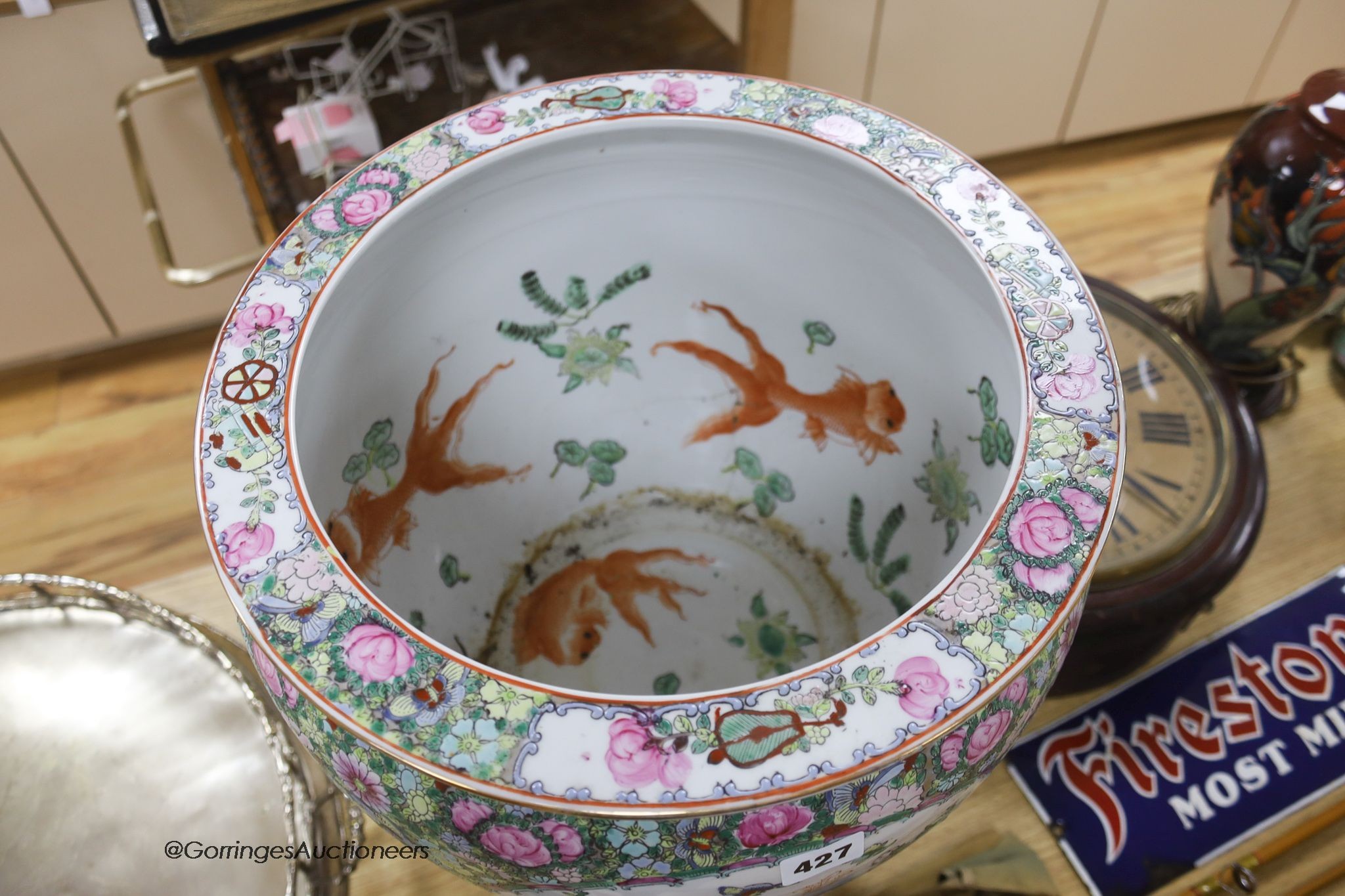 A modern Cantonese export famille rose fish bowl, on hardwood stand, overall height 51cm